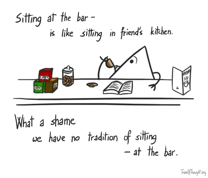 Triangle-person is pictured sitting at the bar, sipping coffee and reading a book. Caption: Sitting at the bar - is like sitting in friend's kitchen. Below: What a shame we have no tradition of sitting - at the bar.