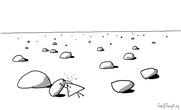 A field of stones is shown stretching into the distance. At one of the stones there is a Triangle-person trying to turn it upside down.