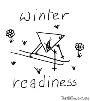 Triangle-person wearing ski, standing in a flower meadow: winter readiness